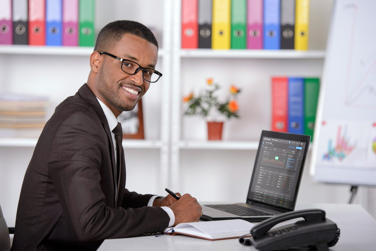 A school administrator reviewing an interview report and attendance insights in ClarityBase
